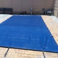 The Benefits Of Using Swimming Pool Covers For Energy Savings And Safety